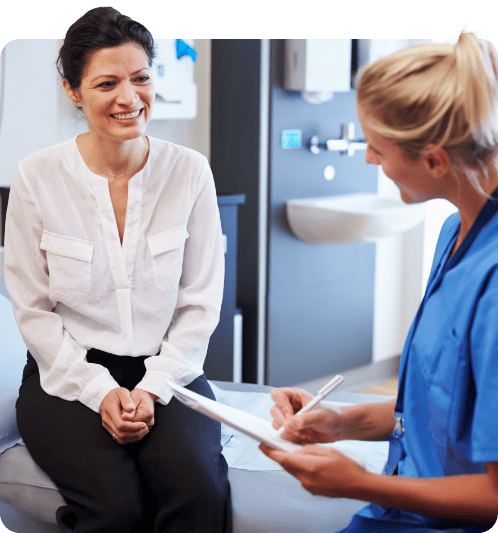 Patient smiling with doctor